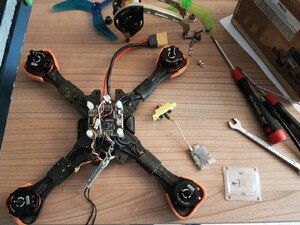 Copter with electronics stack half-way disassembled