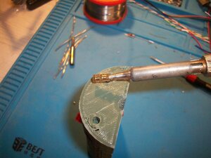 Heat-melt insert on soldering iron