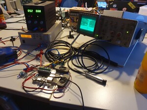 Test setup with two lab power supplies (12V and 5V)