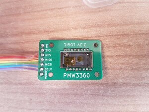 Bottom of PMW3360 breakout board, without lens. Note the kapton tape which needs to be removed!