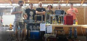 The winning teams with their cocktail machines